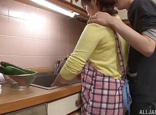 Naturally busty Asian housewife likes having her natural tits sucked