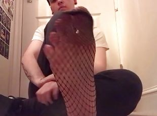 Twink, teen boy feet in fishnets