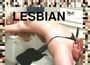 Barbare Dare licking her lesbian babe pussy in the toilet