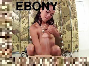 Cute ebony babe giving a tittyjob