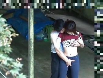 Horny, sensual and filthy Asian couple making out and outdoor fucking