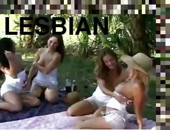 Four gorgeous chicks have lesbian orgy at a picnic