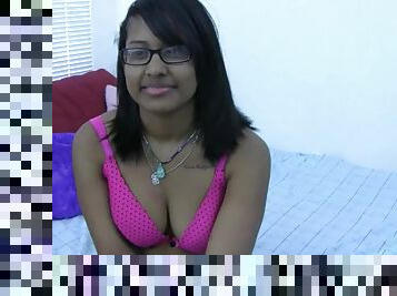 Horny Indian brunette with glasses lets you watch her play in bed