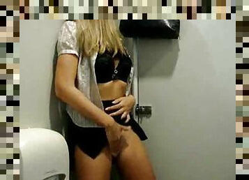 Hottie plays with pussy in bathroom