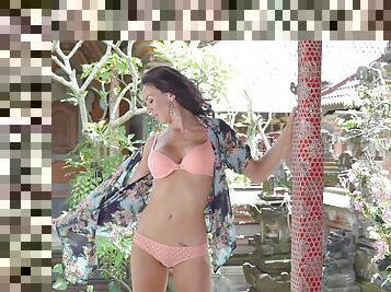 Erotic beauty outdoor in bra and panties shows off ass and tits