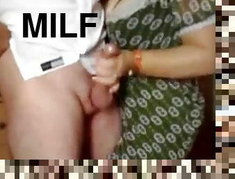 A lustful milf gives hand to her hubby in homemade sex tape