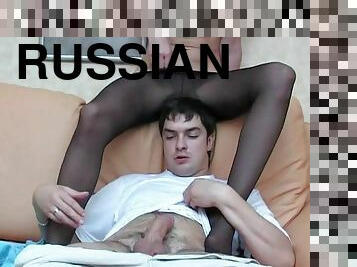 Russian blonde in black stockings footjob and fucking