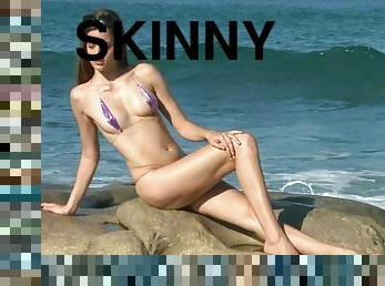 Slim female in her purple bikini rubbing on her little clit