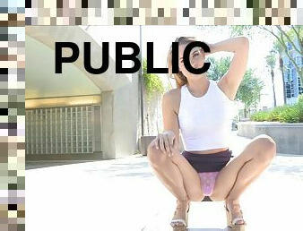 Short purple skirt makes public flashing easy for her