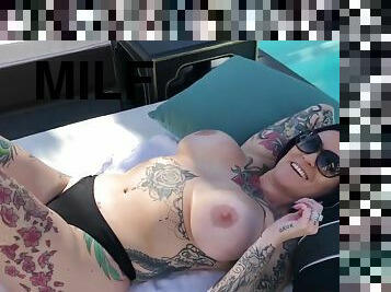 Tattooed MILF masturbates and sucks cock outdoors