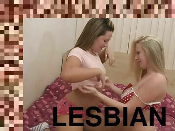 Lesbian couple helping each other out with masturbation