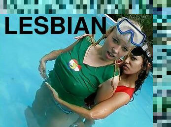 Passionate lesbian couple enjoy playing in the pool before fucking with toys outdoors