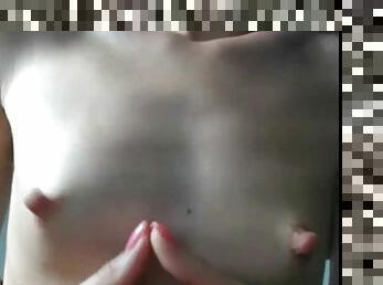 Stunning Brunette showing her hard nipples live on webcam