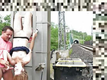 Public sex by the train tracks with a naughty slut in fishnets