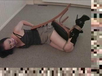 Submissive tied-up Emma struggling for her freedom looking tempting