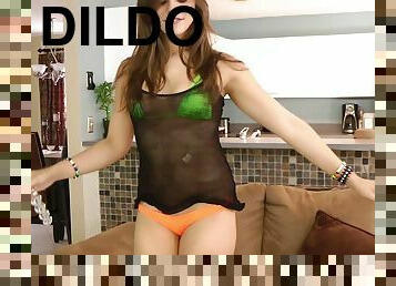 Bikini-clad slut with long dark hair enjoying a mind-blowing dildo fuck