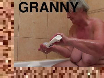Granny with an incredible pair of saggy tits fucks him