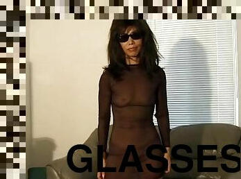 Sheer lingerie and sunglasses on a masturbating Asian girl