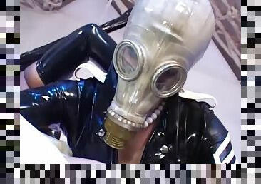 Crazy rubber and gas mask kink threesome starring lesbians