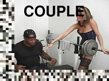 A sexy White babe has an interracial sex in a gym
