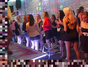 Party girls fool around with the male strippers in the club