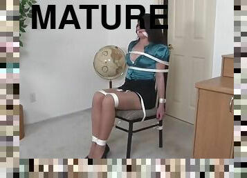 Chairtied woman