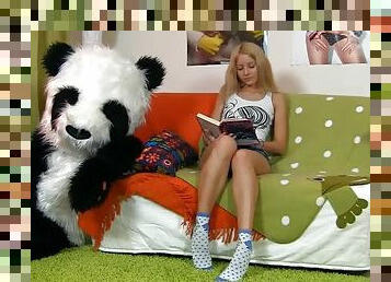 Sexy girl having fun with her panda bear