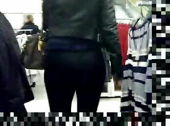 Big-assed chick wearing legging caught on camera in a shop