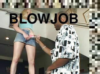 Amber Rain gives a sloppy blowjob and enjoys rough interracial sex