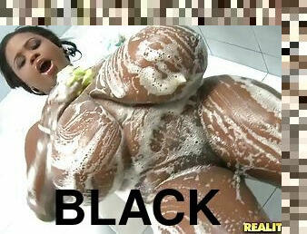 Black bitch Miosotis lets some dude play with her huge natural tits