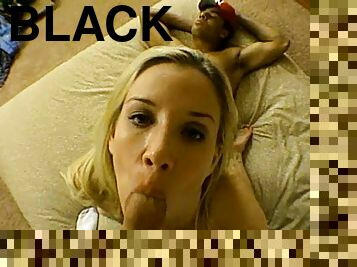 Slutty blonde sucks and rides two black dicks in POV clip