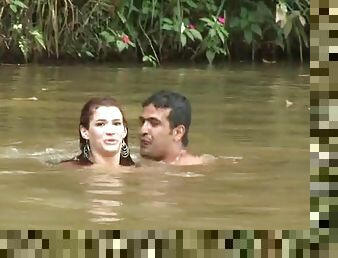 Sexy Dani Duran swims in a lake and fucks on a lawn