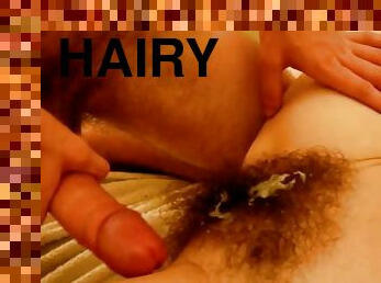 Short-haired girl toys her hairy pussy and rides a dick