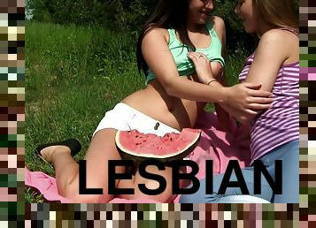 Two slim brunette babes have hot sex at a picnic