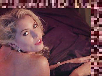 Backstage clip of cute blonde Carly Lauren posing for Playboy