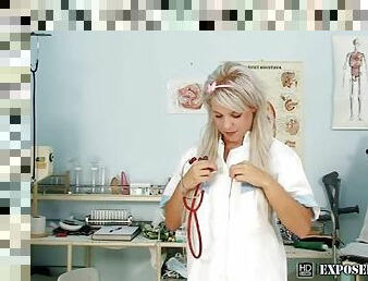 Blond nurse Sabina dressing off then dildoying herself on gynochair