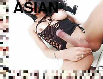 Asian ts jerks off her shecock using toy