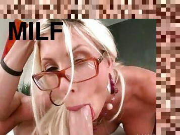 Ash blonde MILF in glasses mouth fucking a massive shaft in POV