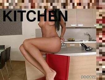 Ashley Bulgari pleases herself with fingering in the kitchen