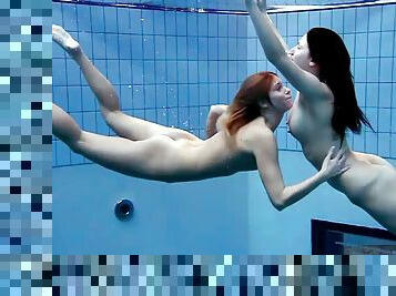 Long hair lesbian teen swimming lovely with her babe