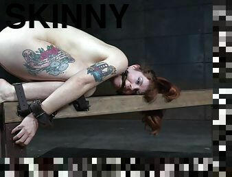 Skinny ginger bitch loves being bound in the dungeon