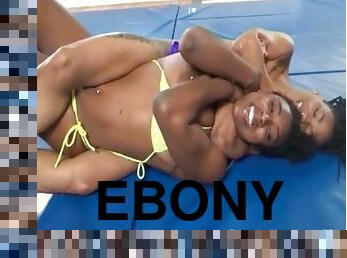 Two horny ebony bimbos enjoy wrestling in the nude