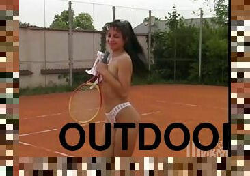 Petite brunette chick gets fucked outdoors after playing tennis