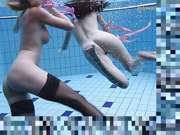 Nice ass lesbain teen widening legs while swimming in pool