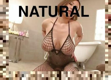 Big natural boobs are amazing on the Japanese cock stroker