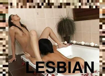 Cleopatra style girl gets her pussy licked by other girl in a bathtub