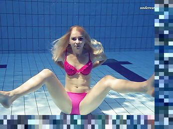 Solo model blonde teen widening legs in the pool seductively