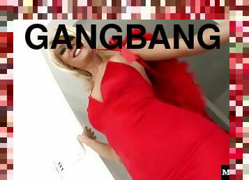 A very pretty blonde finds herself in the middle of a hot gangbang