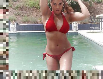 Mercedes Carrera wears a red bikini while bouncing on a boner