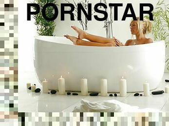 Admirable pornstar baths her fancy pussy before rubbing it with vigor while enjoying the plesure